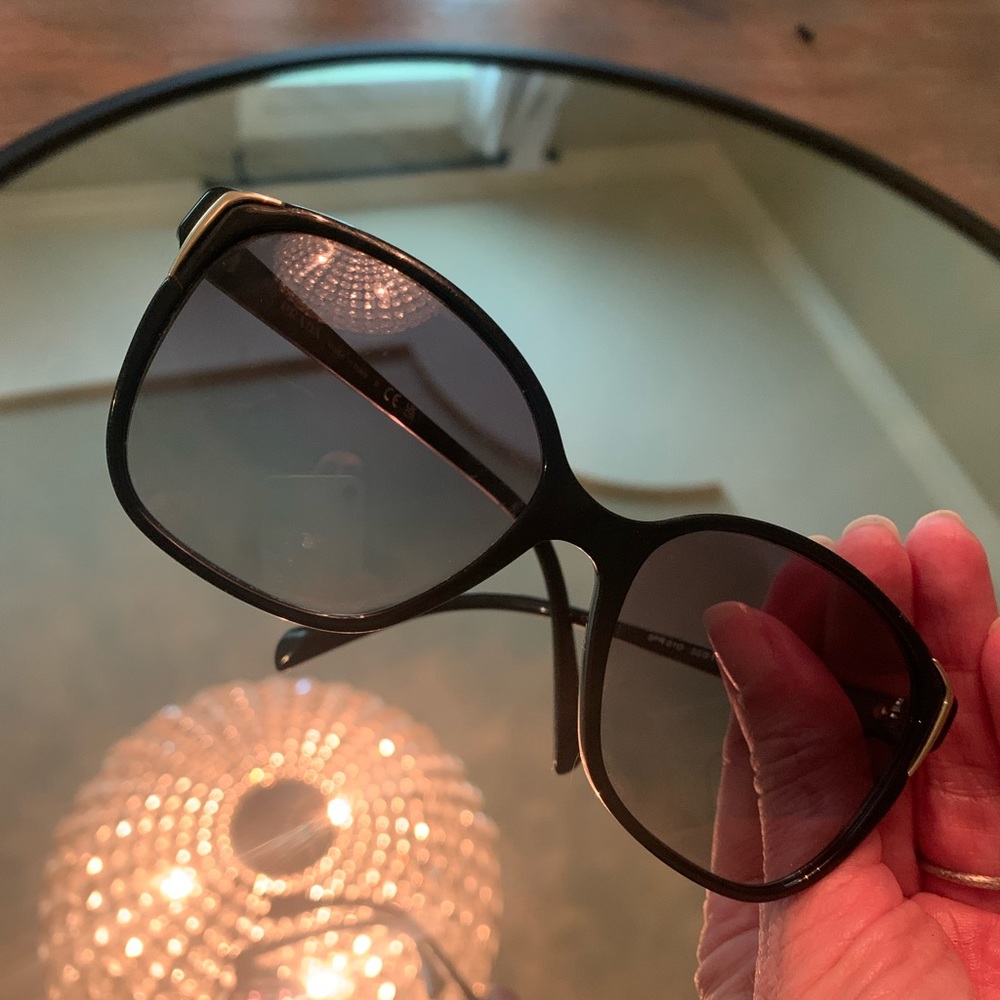 Prada sunglasses purchased in Paris. Excellent condition.